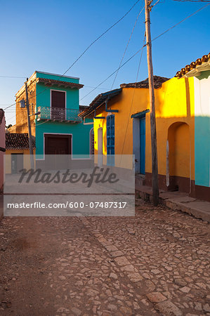 Colorful buildings on cobblestone street, Trinidad, Cuba, West Indies, Caribbean Colorful buildings on cobblestone street, Trinidad, Cuba, West Indies, Caribbean