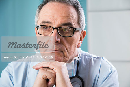 Close-up of Doctor leaning on hands Close-up of Doctor leaning on hands