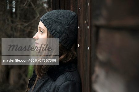 Portrait of teenage girl outdoors wearing hat, Germany Portrait of teenage girl outdoors wearing hat, Germany