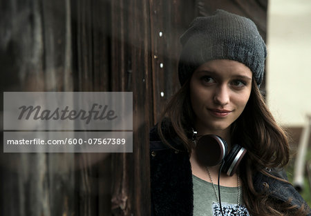 headphones around neck
