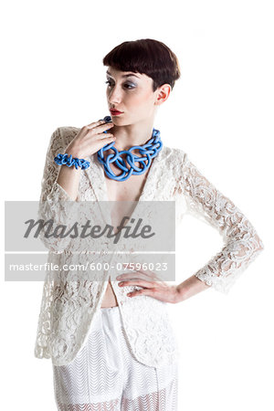 Portrait of Young Woman wearing Modern Jewellery, Studio Shot Portrait of Young Woman wearing Modern Jewellery, Studio Shot