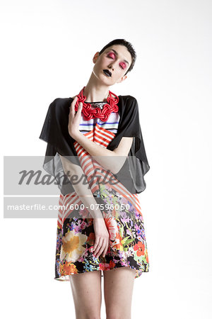Portrait of Young Woman wearing Modern Jewellery, Studio Shot
