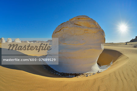 Rock Formations and Sun in White Desert, Libyan Desert, Sahara Desert, New Valley Governorate, Egypt Rock Formations and Sun in White Desert, Libyan Desert, Sahara Desert, New Valley Governorate, Egypt