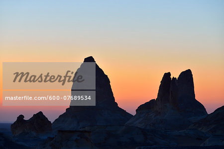 Silhouette of Rock Formations at Dawn in White Desert, Libyan Desert, Sahara Desert, New Valley Governorate, Egypt