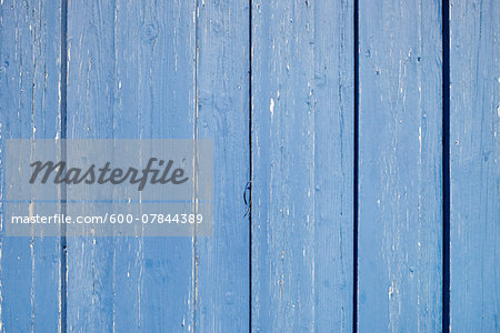 Close-up of blue, painted wooden wall, France