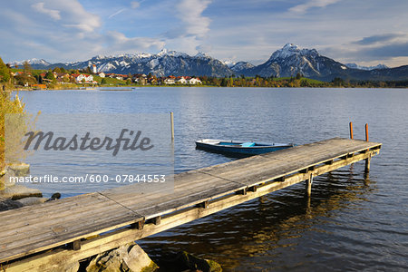 Wooden Jetty with Rowboat, Hopfen am See, Lake Hopfensee, Bavaria, Germany