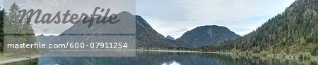 Scenic view of mountains and a clear lake (Plansee) in autumn, Tirol, Austria