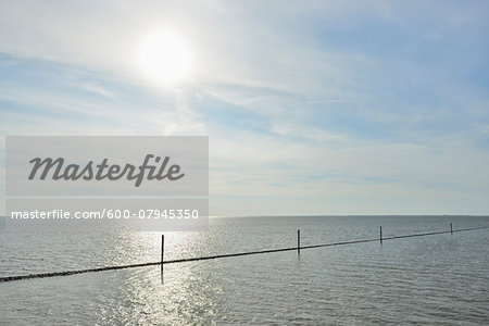 North Sea with Sun in Summer, Norderney, East Frisia Island, North Sea, Lower Saxony, Germany North Sea with Sun in Summer, Norderney, East Frisia Island, North Sea, Lower Saxony, Germany