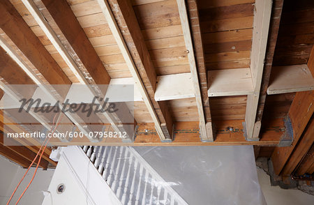 Ceiling Joists And Staircase Of Home Under Construction