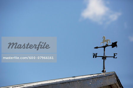 Weather Vane on Roof and Blue Sky, Niagara-on-the-Lake, Ontario, Canada