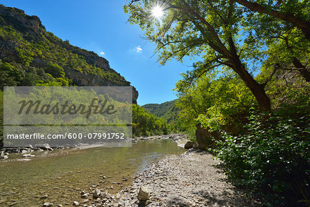 River flowing through Canyon with Sun in the Summer, Gorges de L Eygues, Saint May, Remuzat, Drome, France
