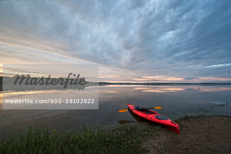 Kayak on Calm Lake, Saskatchewan, Canada