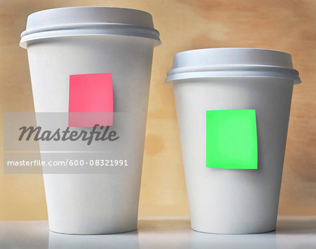 https://image1.masterfile.com/getImage/600-08321991em-closeup-of-two-takeout-coffee-cups-with-sticky-notes-stock-photo.jpg