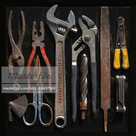 Overhead View of Assorted Old and Rusty Tools