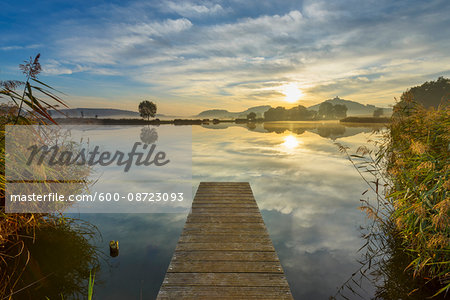 Wooden Jetty with Reflective Sky in Lake at Sunrise, Drei Gleichen, Ilm District, Thuringia, Germany