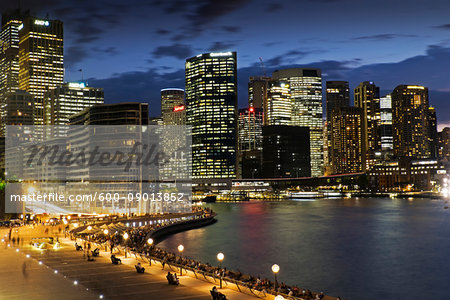 Seaside Promenade at the Circular Quay and Sydney skyline at dusk, Australia