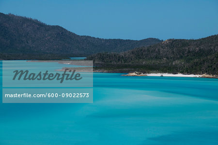 Turquoise waters of the Coral Sea at the Whitsunday Islands in Queensland, Australia Turquoise waters of the Coral Sea at the Whitsunday Islands in Queensland, Australia