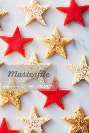 Marzipan topped star cookies with festive decoration