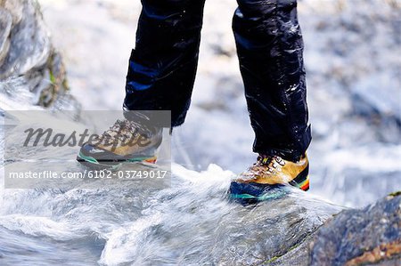 Boots in a stream.