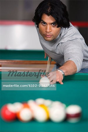 A man playing pool.