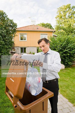 A man throwing garbage, Sweden.