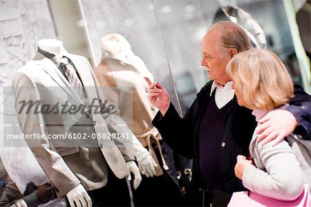 A senior couple window-shopping, Stockholm, Sweden.
