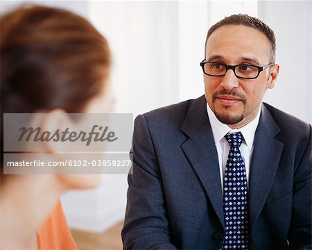 Businessman and woman having discussion