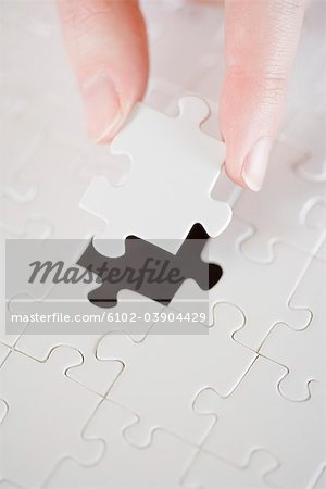 A puzzle with a missing piece.