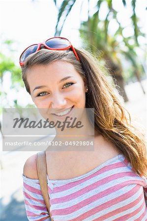Portrait of teenage girl, outdoors