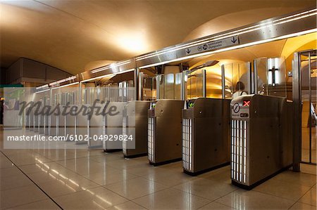 Turnstiles at subway station Turnstiles at subway station