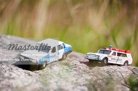 Toy police car and ambulance