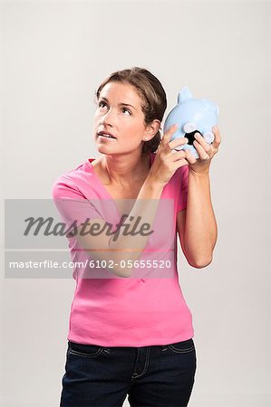 Woman with a money box