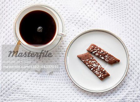 Black coffee with coffee cookies, directly above