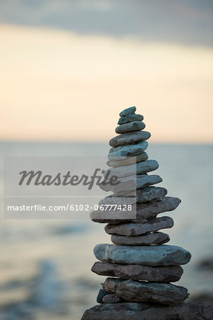 Pile of rocks against evening sky