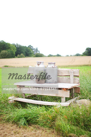 Wooden bench, fields in background