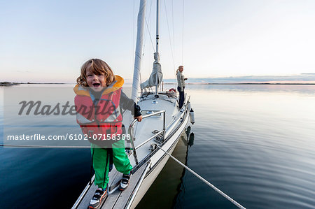 Happy boy on sailing boat