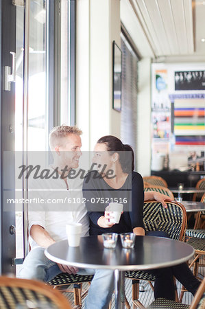 Happy couple in cafe, Vaxjo, Smaland, Sweden