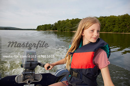 Teenage girl on boat, Skane, Sweden