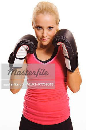 Young woman boxing, studio shot