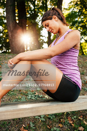 Young woman stretching, Uppsala, Sweden