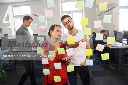 People in office with post-its