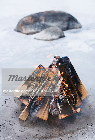 Campfire on beach, close-up