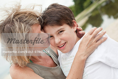 Mother with son on beach