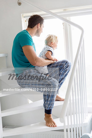 Father with son on stairs