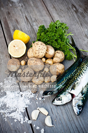 Raw food on wooden background