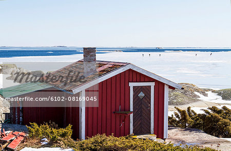 Wooden building on coast