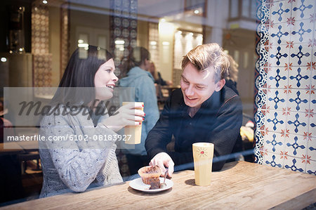 Young couple in cafe