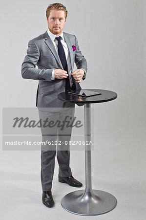 Businessman having presentation, studio shot