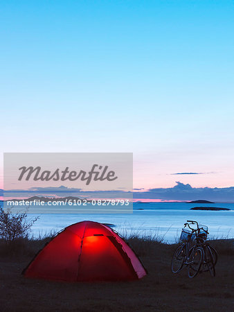 Tent at sea, dusk