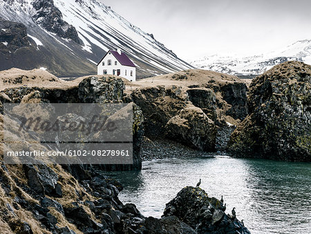 House on rocky coast House on rocky coast
